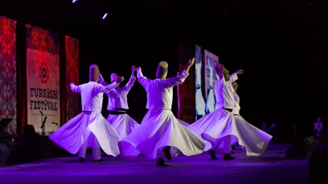 A group of Sufi whirling dervishes perform at the opening ceremony of the Turkish Festival at the Donald E. Stephens Convention Center, in Chicago, Illinois, U.S.